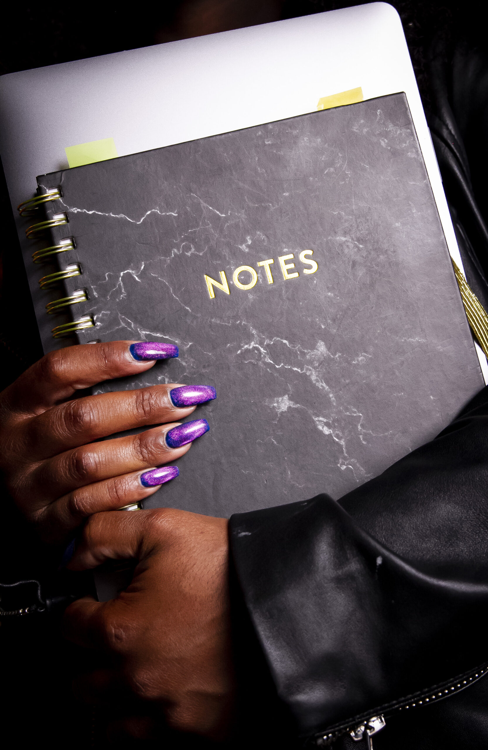 Woman holding notebook